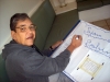 José Antonio preparando o cartaz receptivo aos lobinhos, em 29/06/2013